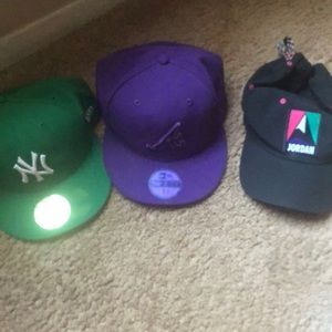 Selling 2 fitted caps and 1 Jordan made to fit all